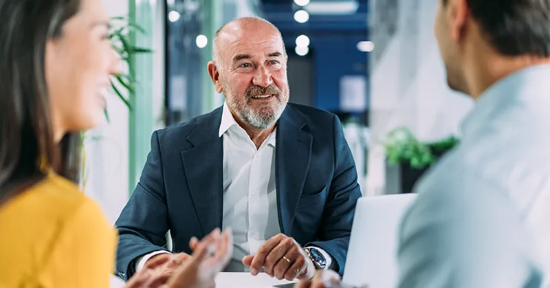 Lawyer talking to clients