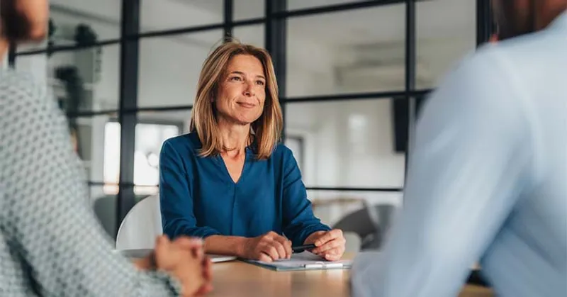Lawyer talking to clients