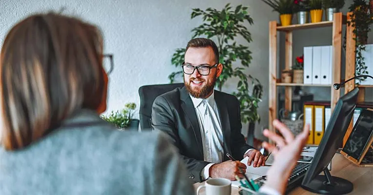 Lawyer talking to clients