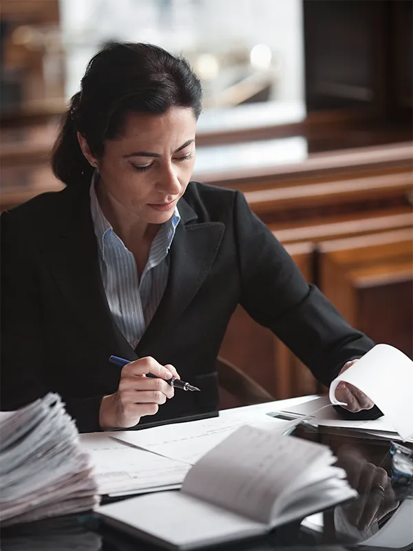 Lawyer looking through documents m-auto