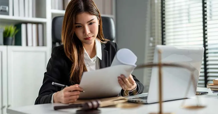 Lawyer reviewing documents