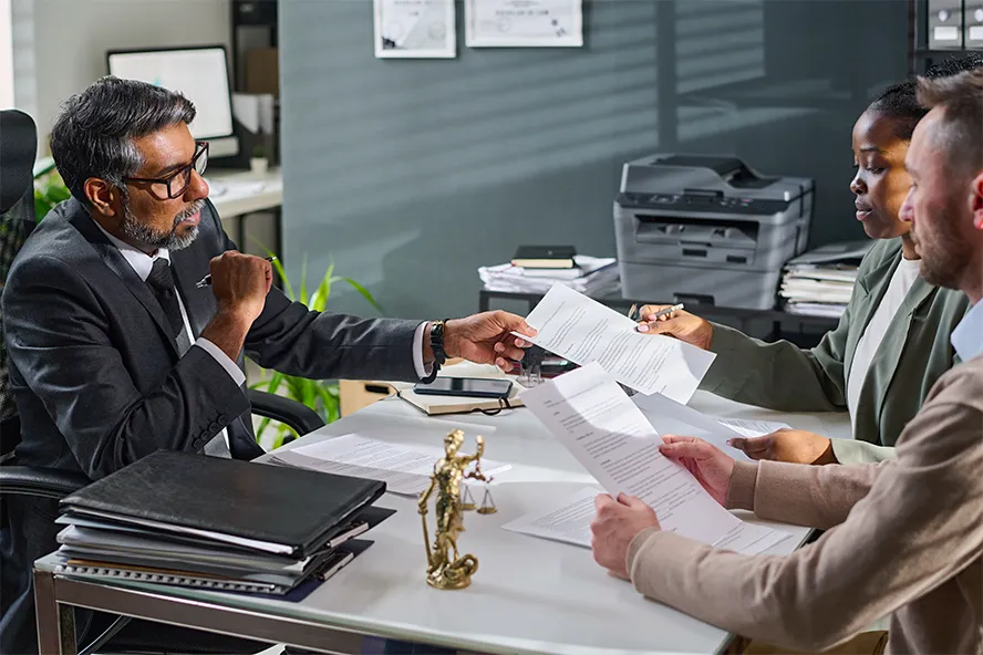 Lawyer talking to clients