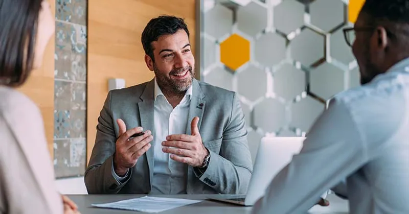 Lawyer talking to clients